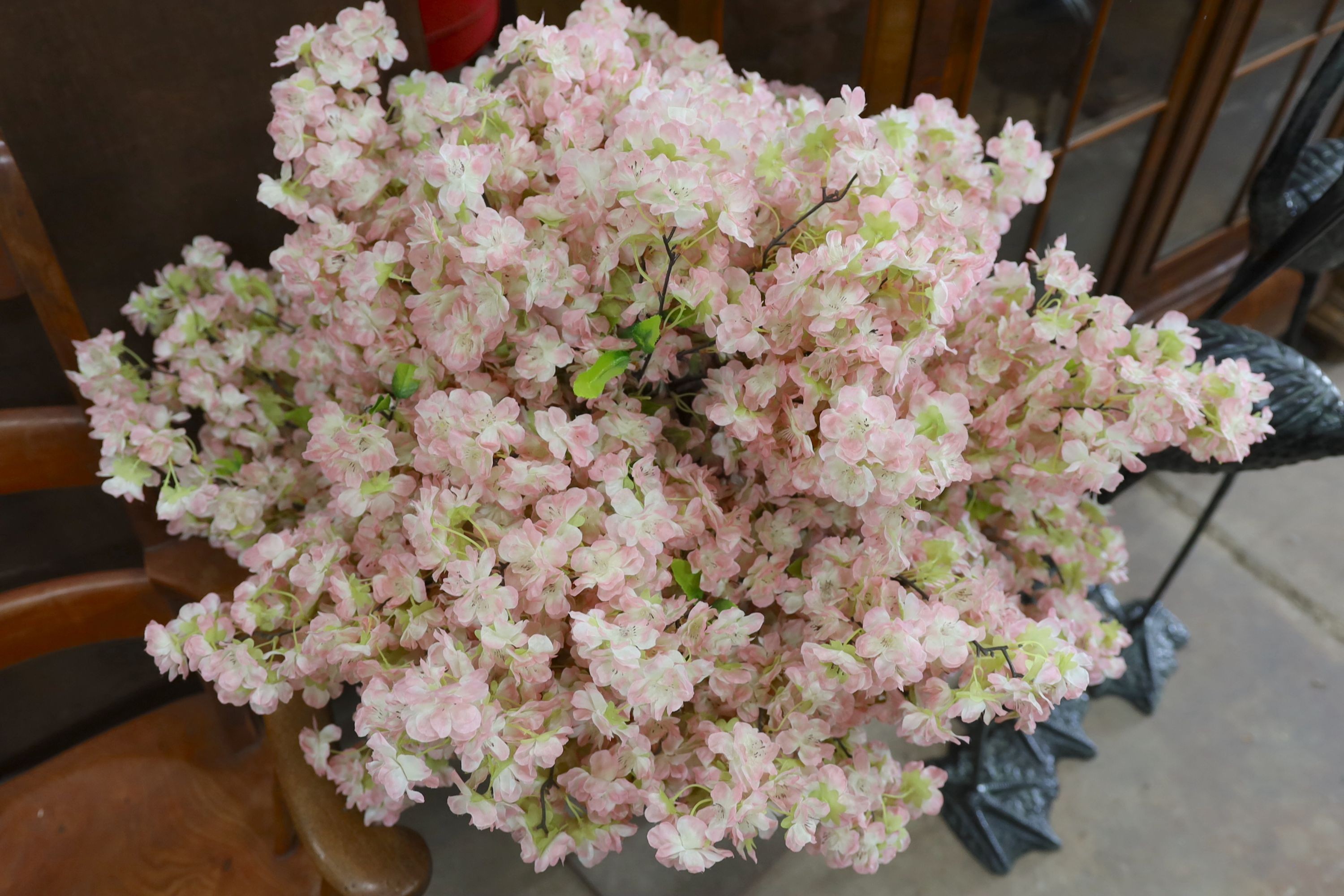 A small faux cherry blossom tree ornament, height 110cm